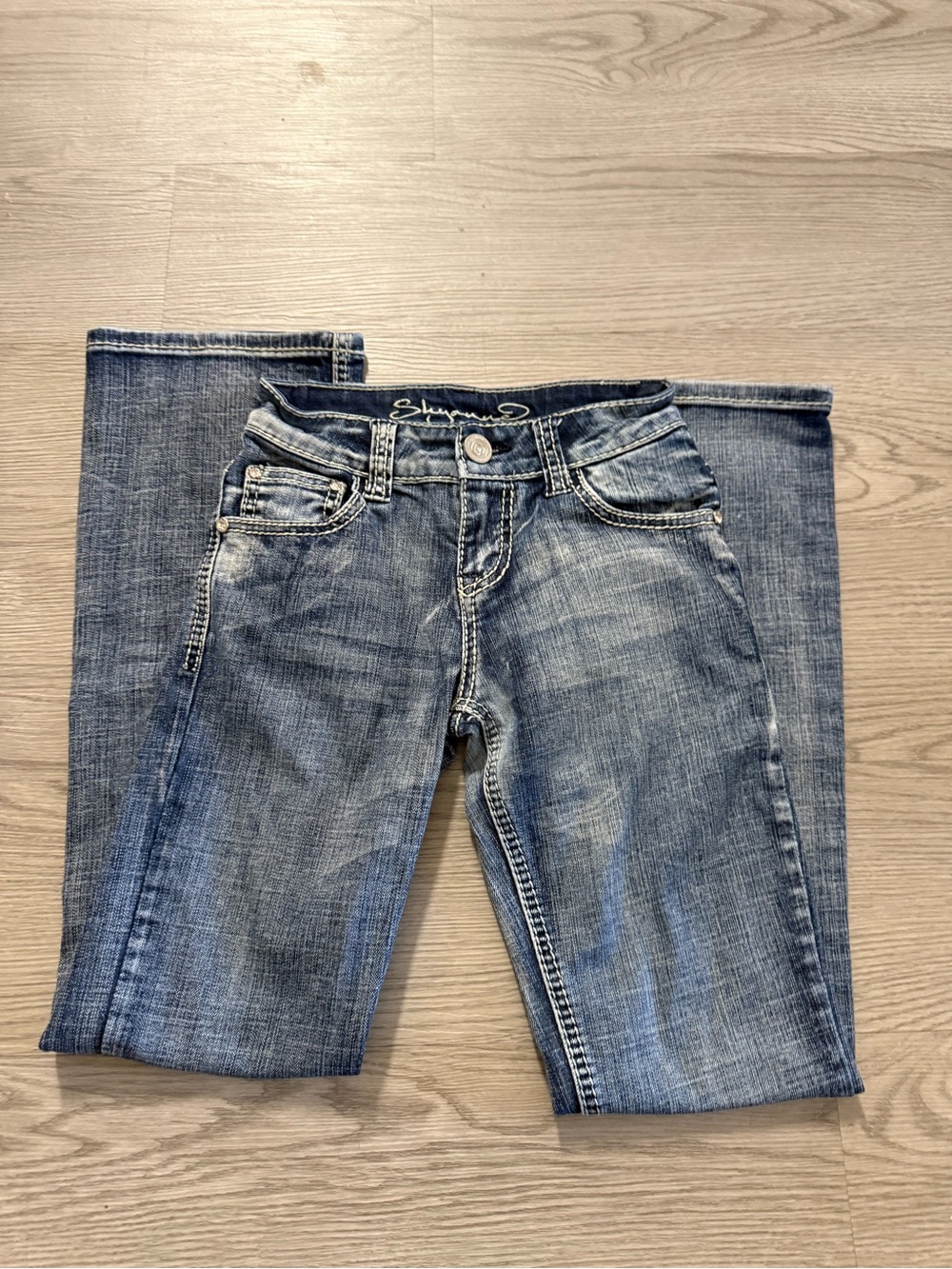 Girls Skyaun jeans feature a distinctive embroidered logo  Size 10